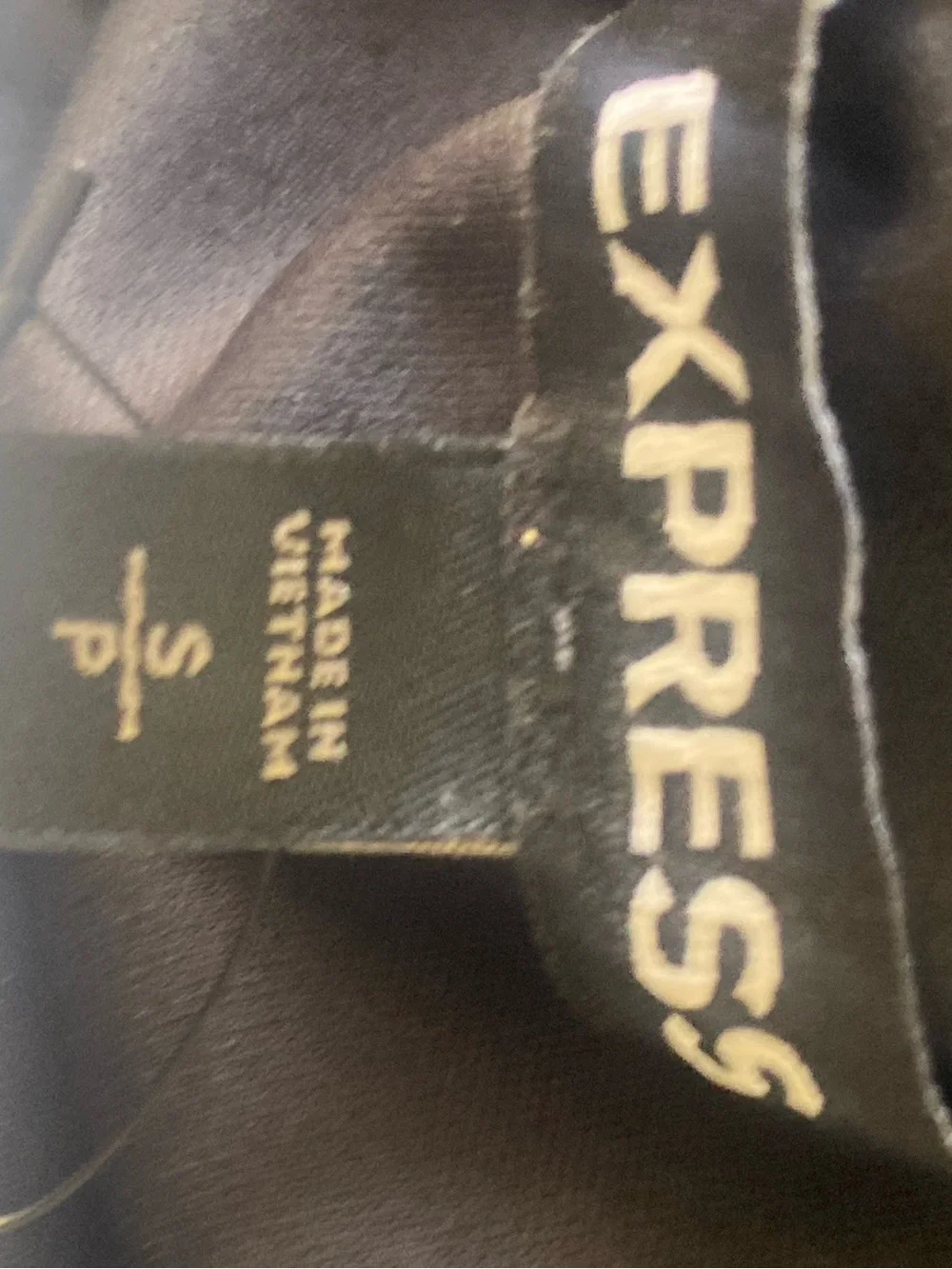 NWT Express Black Romper with Ruffled Hem. Size Small.